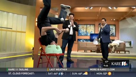 David juggling on his head in jumbo