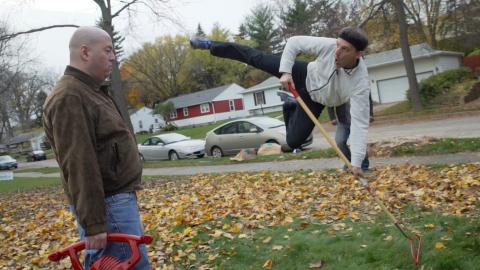 David dancing with shovel and doing a big jump